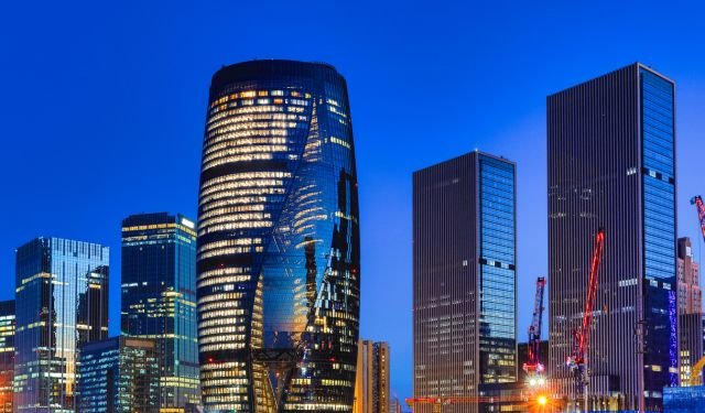 city by night, high rise towers and skyscrapers